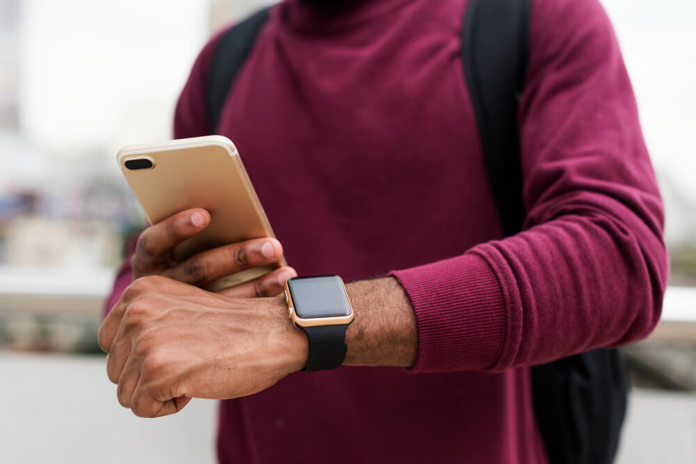 man using apple watch daily